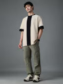 Official Ben 10: Omnitrix Men Cream Oversized Fit T-Shirt